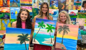 Customers Showing their Completed Artworks